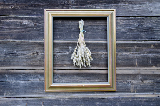 wheat bunch and golden retro picture frame