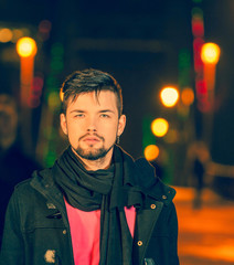 Portrait of a young handsome man, model of fashion