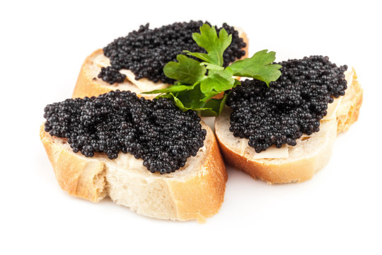 Sandwiches with black caviar isolated on white background