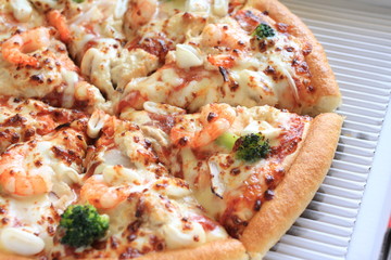 close up of seafood pizza