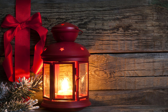 Christmas abstract background with red ribbon on vintage boards