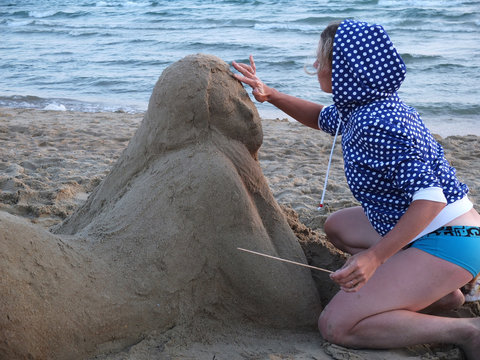 Sand Sculpture And The Sculptor