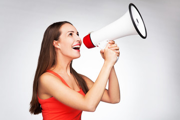 Woman shouting through megaphone