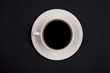 White cup of coffee top view