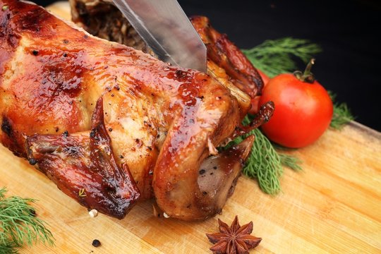 Whole roasted chicken with fresh vegetables
