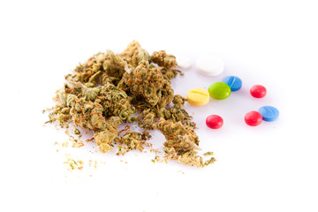 marihuana and pills isolated on white background