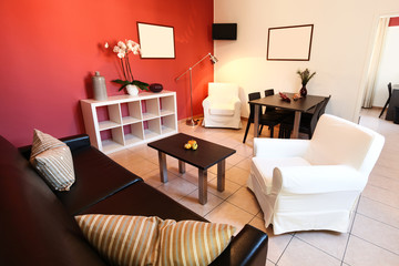 interior of apartment, living room with red wall