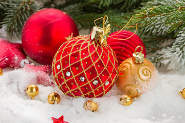 red christmas ball in snow