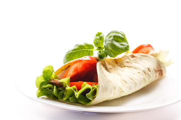 pita bread with lettuce, salami and tomatoes
