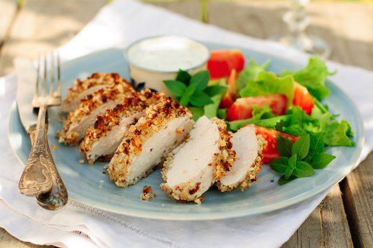 Sliced Peanut Crusted Chicken Breast With Fresh Salad