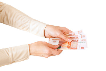 Women holds few 5000 roubles bank notes