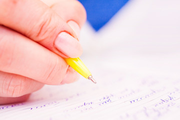 Obraz na płótnie Canvas Business Woman Pisanie piórem w notatniku