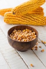 Fresh corn on wooden background