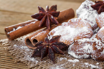 Cookies with anise stars and cinnamon on sacking