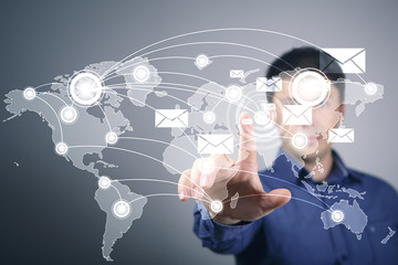 Businessman pressing social media icon