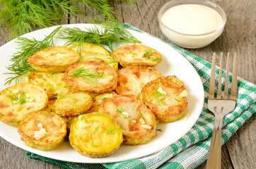 Fried zucchini with dill and garlic