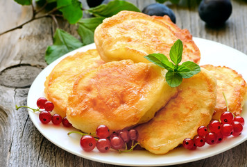 Pancakes on wooden table