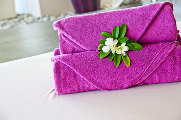 Towels on the bed in a spa