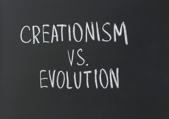 Obraz premium creationism vs. evolution