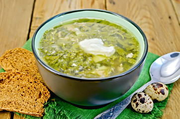 Soup green of herbs on the board