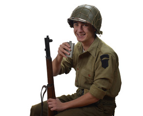 young American soldier takes a sip of alcohol