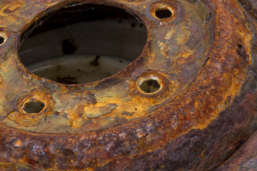 Rusty car wheel, close up