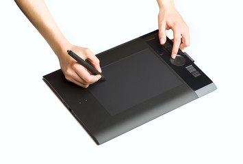 Graphic Tablet Being Used with a Pen - 58438282