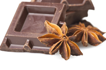 Closeup detail of chocolate parts on white background.