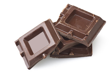 Closeup detail of chocolate parts on white background.