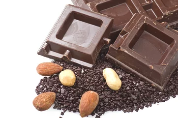 Gardinen Closeup detail of chocolate parts on white background. © Orlando Bellini