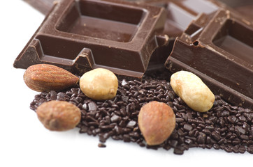 Closeup detail of chocolate parts on white background.