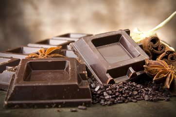 Closeup detail of chocolate parts on white background.