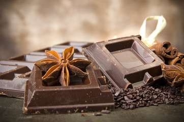 Closeup detail of chocolate parts on white background.