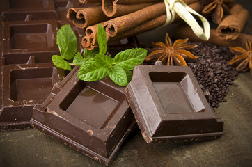 Closeup detail of chocolate parts on white background.