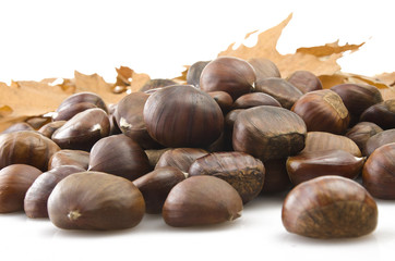 Delicious group of chestnuts close up background
