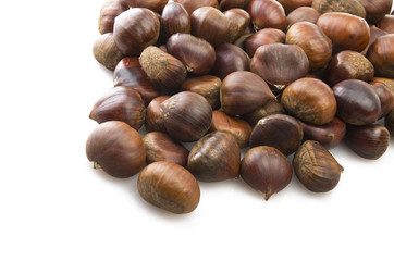 Delicious group of chestnuts close up background
