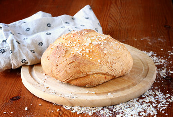 traditional fresh bread on wooden table