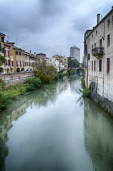 Fototapeta na wymiar Traditional Italian Buildings by a River