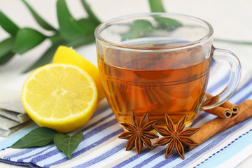 Tea, lemon, star anise and cinnamon