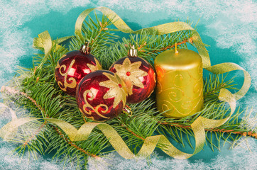 christmas decorations with candle and spruce