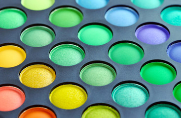 Professional eye shadows palette. Makeup background