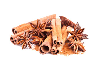 cinnamon and anise star over white