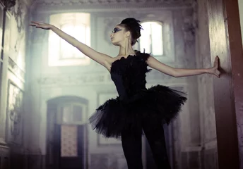 Wall murals Picture of the day Black swan ballet dancer in move