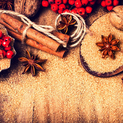 Christmas background with Brown sugar, anise star and cinnamon s