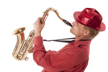 Man playing saxophone with devotion
