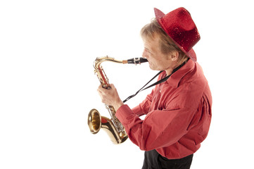 Man playing tenor saxophone from above