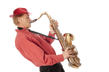 Fototapeta na wymiar Man playing tenor saxophone leaning backwards