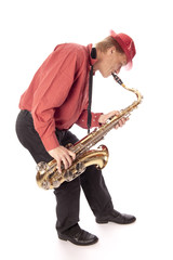 Man playing tenor saxophone bend over