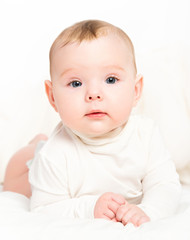 happy  newborn baby on white background