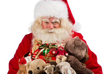 Real Santa Claus carrying big bag full of gifts, isolated on whi